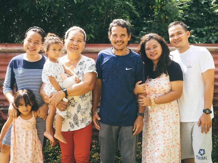 An Australian family poses for a photo outside